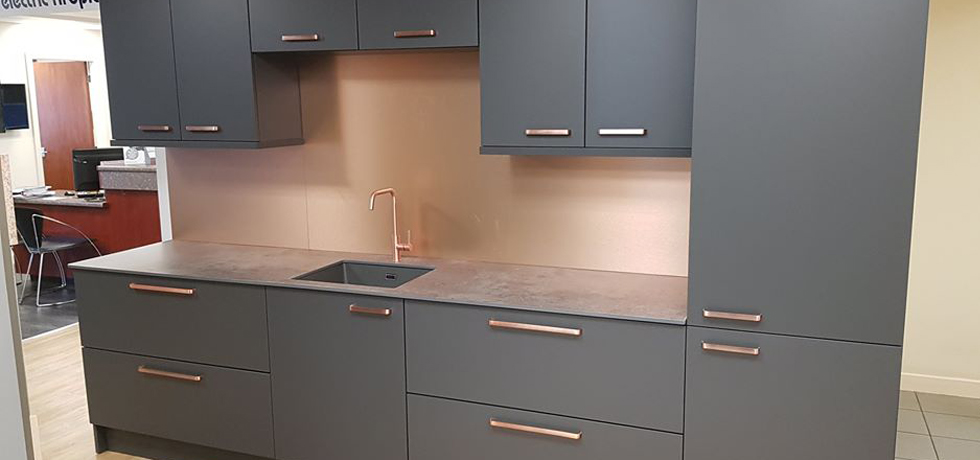 Evolve Caldeira on display at Homecare Supplies, with Brushed Copper splashback 